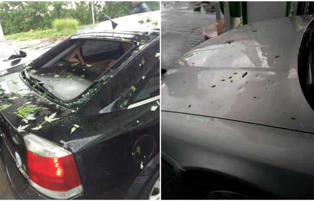 В некоторых автомобилях выбито стекло и вмятины на кузове