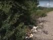 Горы мусора на берегах реки Уж