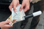 В Ужгороде водитель "БМВ" пытался дать взятку ГАИшнику 50 грн.