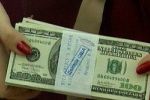 На Закарпатье дети подменили доллары в тайнике отца на фальшивые