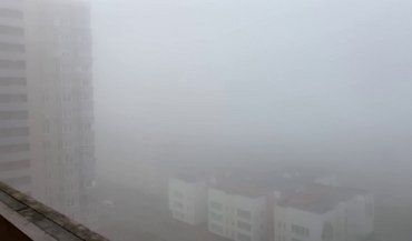 Киев окутал странный туман 