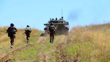 В Донбассе начался отвод войск