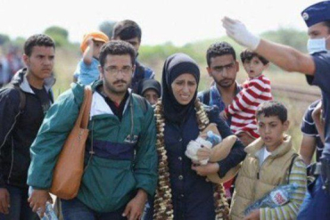 Германия ожидает "экстремальный" наплыв беженцев из Сирии