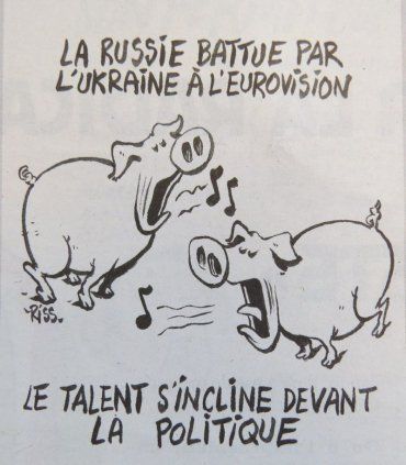Charlie Hebdo изобразил Джамалу и Лазарева поющими свиньями