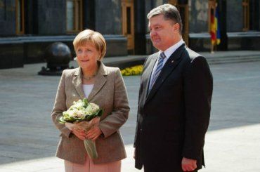 Меркель проведет встречи с Петром Порошенко и Арсением Яценюком