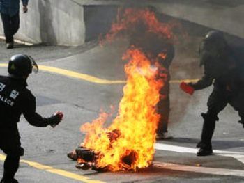 В центре Пекина три человека совершили акт самосожжения