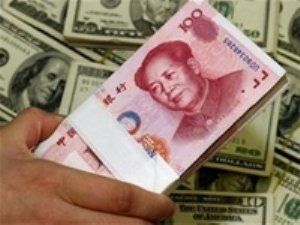 Китай отказался от привязки юаня к американскому доллару